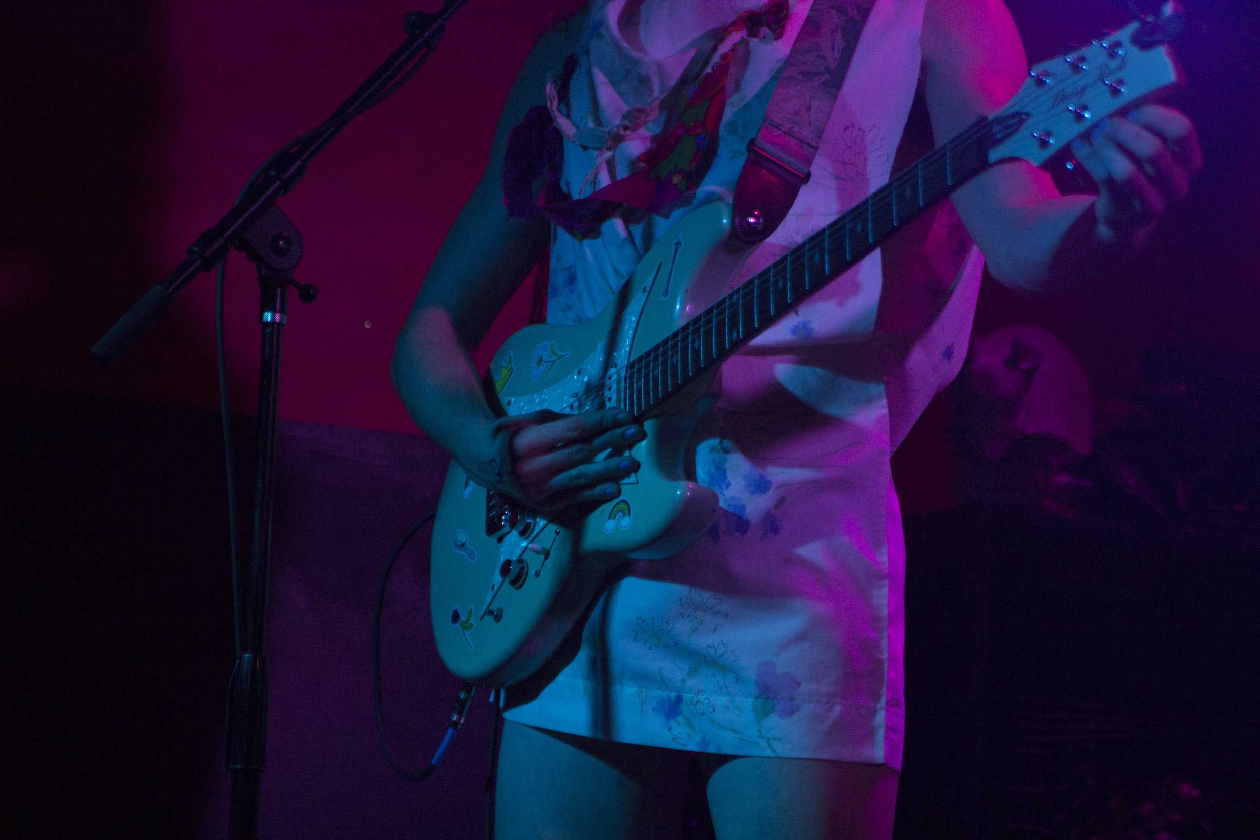   Drummer Liv Bruce took lead guitar for a few songs, while sporting a pillowcase dress made by local drag queen Christeene.  