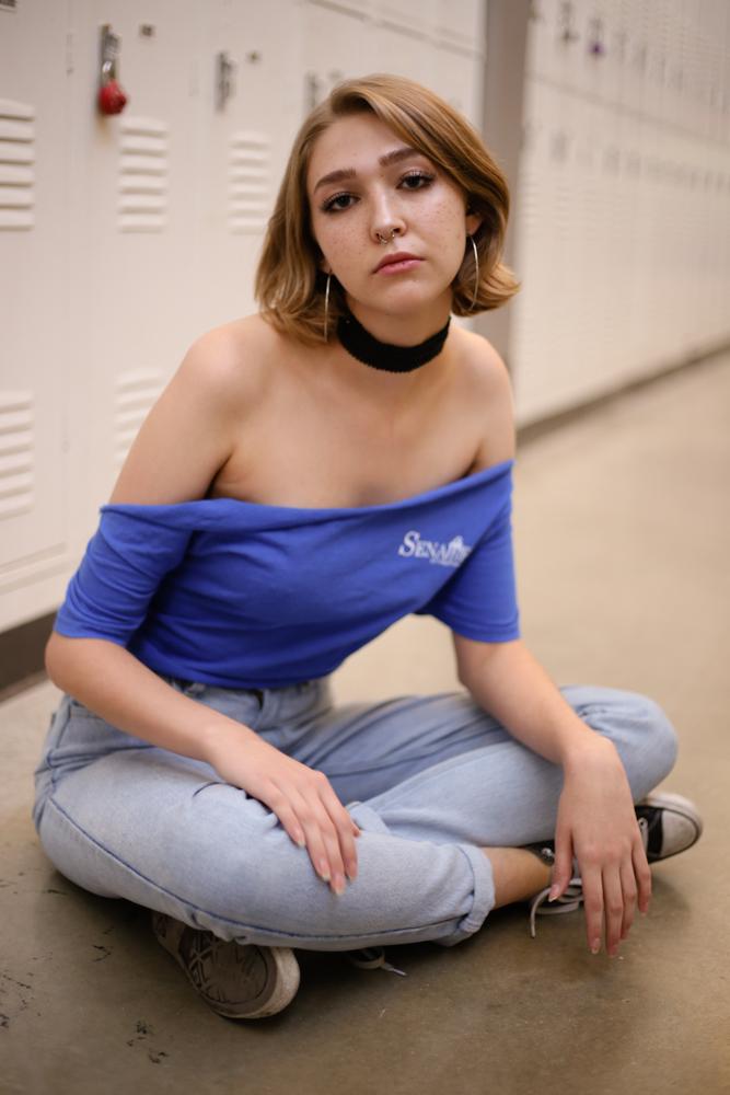  Sophomore Angela Chastain poses wearing an off-the-shoulder top made by Ogunmuyiwa. 