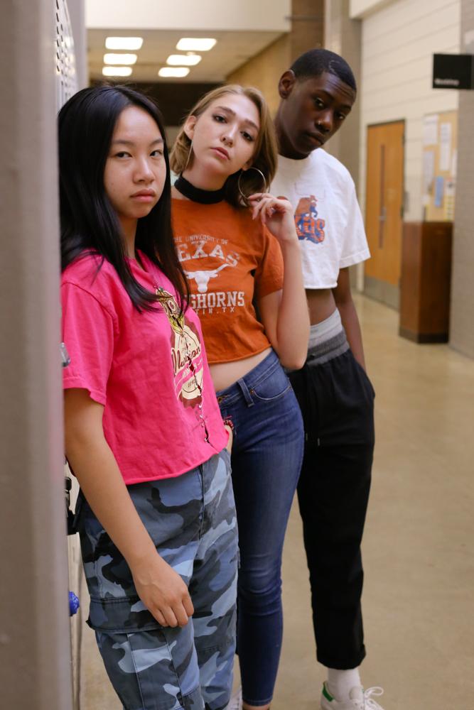  Tran, Chastain, and Pegram stand wearing the looks styled by Ogunmuyiwa.    