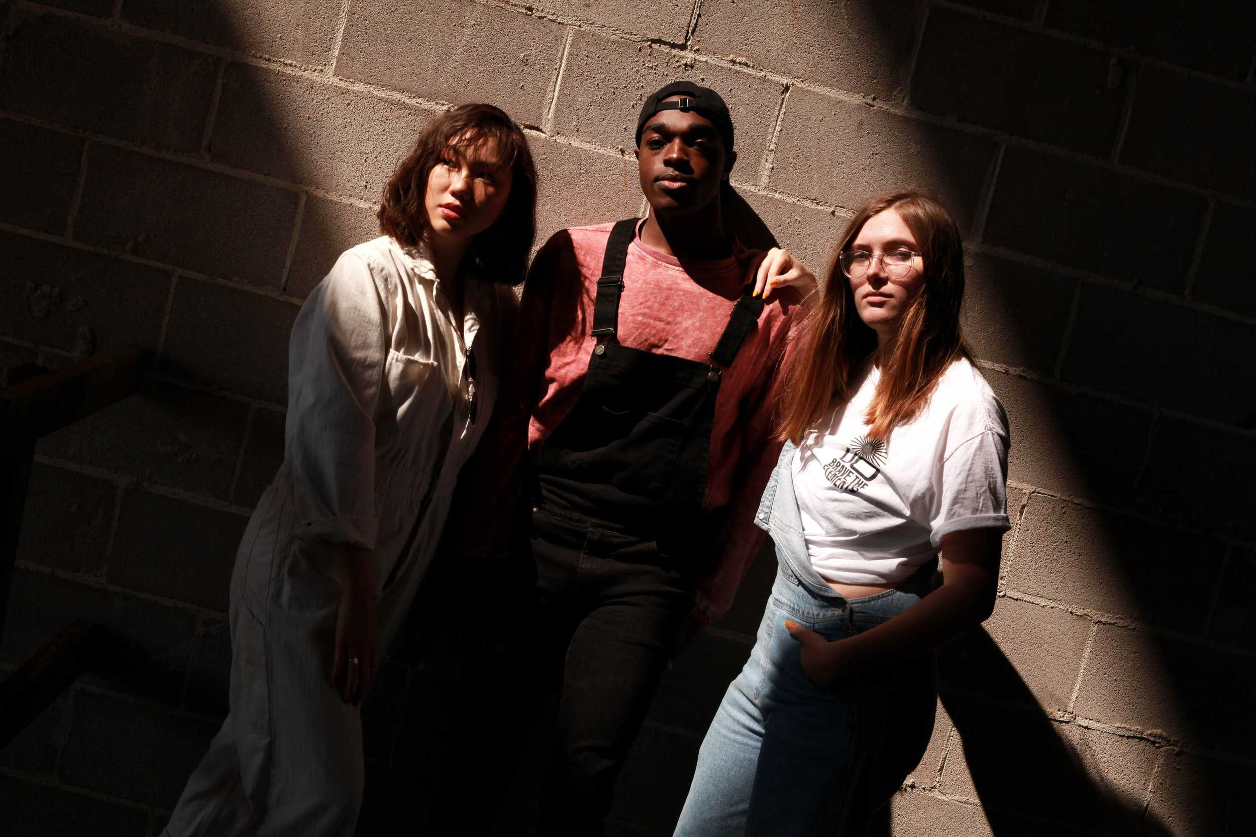   Overalls don’t have to be tame. They come in all flavors. Modeled by Savannah Olson, Malcom Thomas and Ashley Yen.  