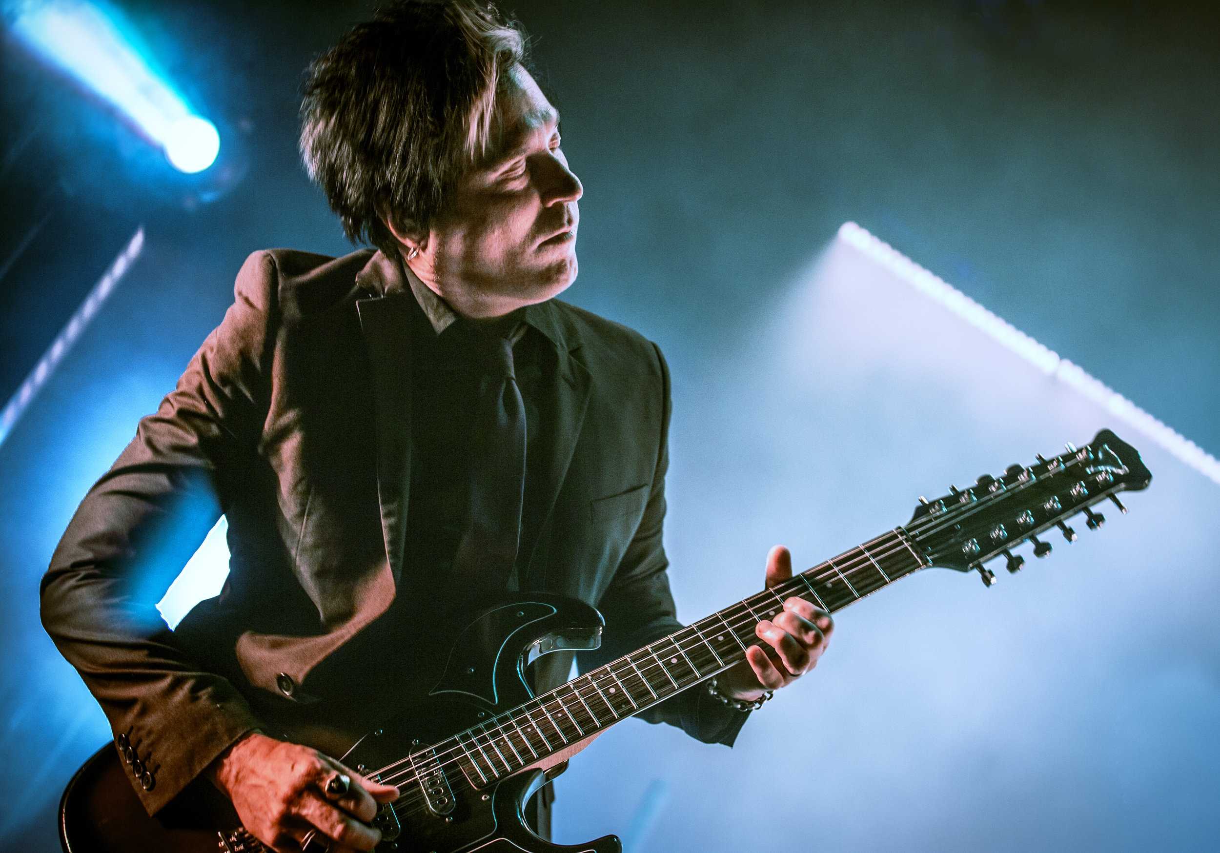   Troy Van Leeuwen was sensational not only on guitar and back-up vocals, but also on keys.       