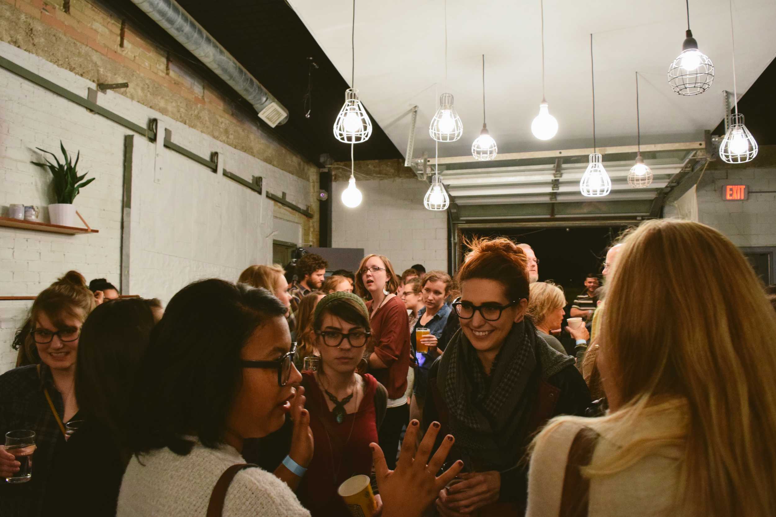  The crowd has time to converse and buy drinks in between acts. 