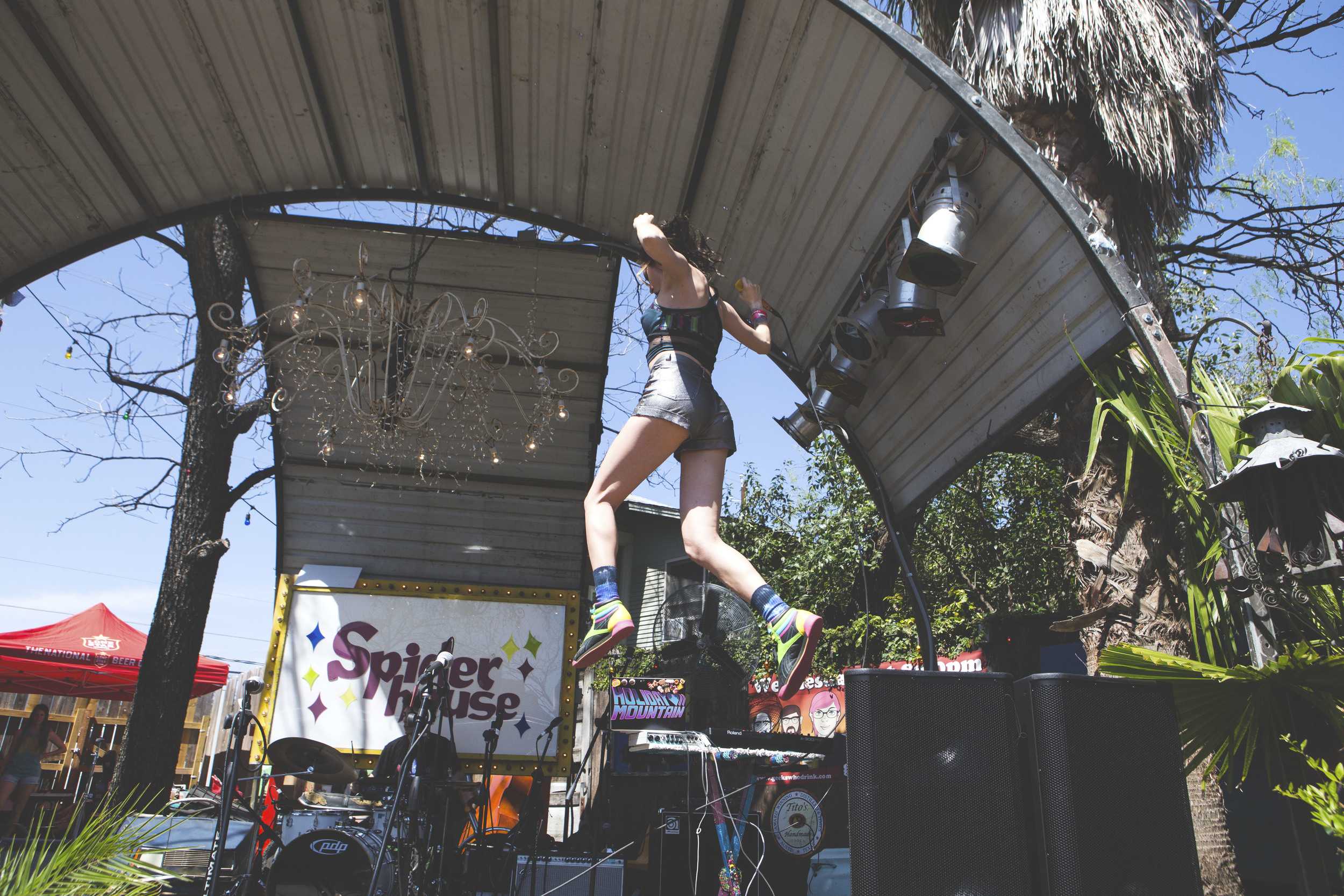  Holiday Mountain, ATX local musician, leaps from a speaker at All the Friends Ball, a free showcase curated by Mother Falcon and hosted at Spiderhouse, on March 14. 