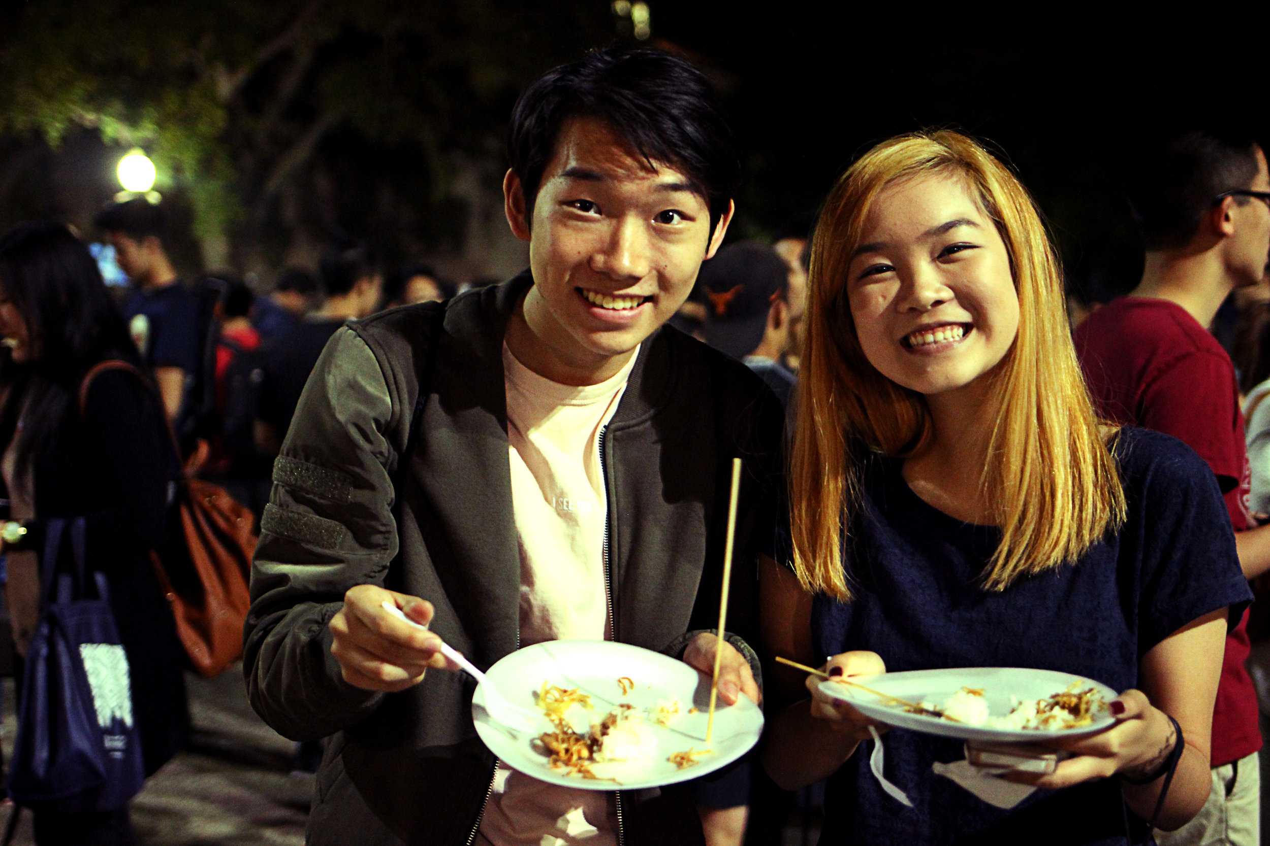   Students enjoy the event's free food.  