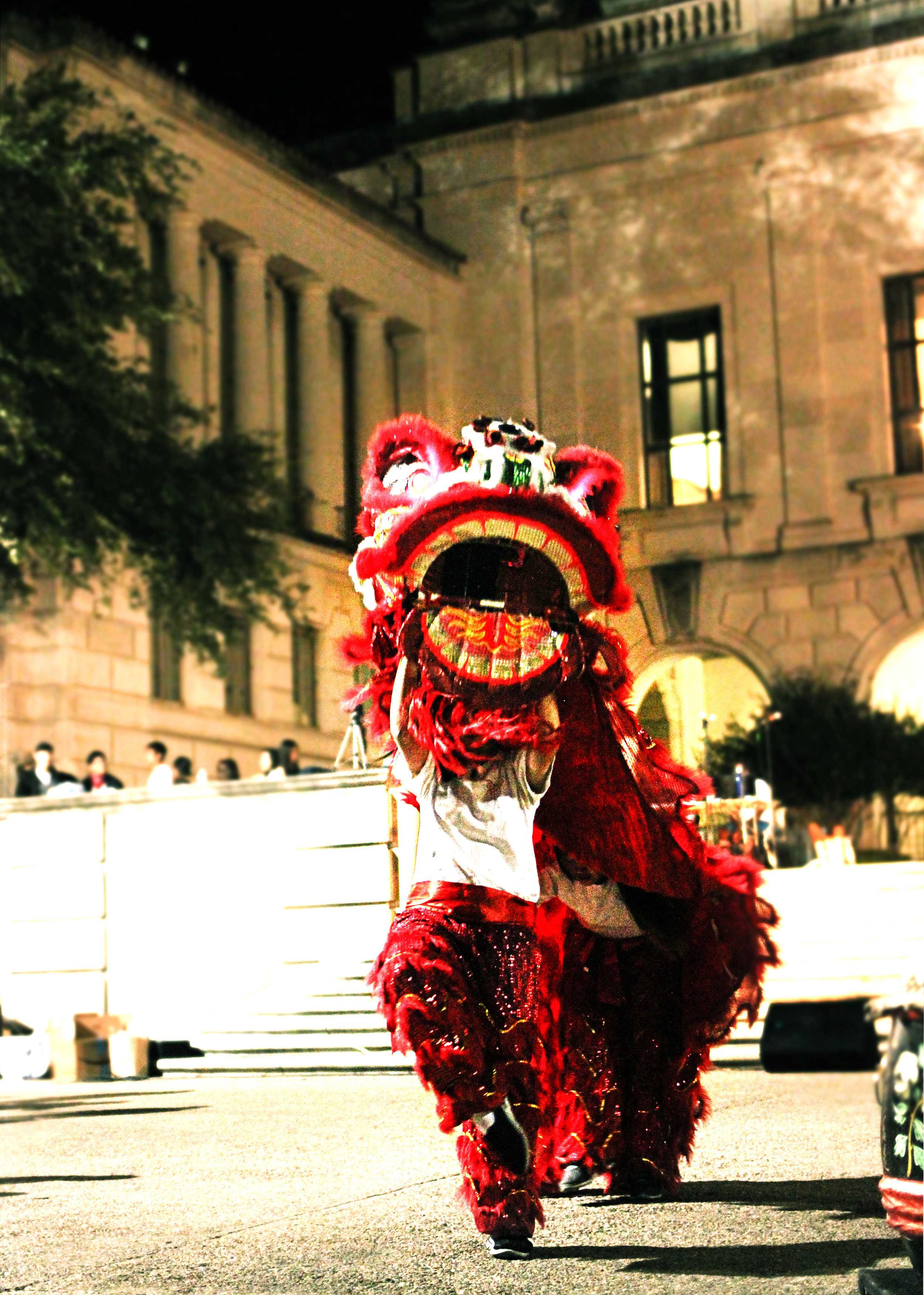   The Texas Dragon Dance Team roars.  