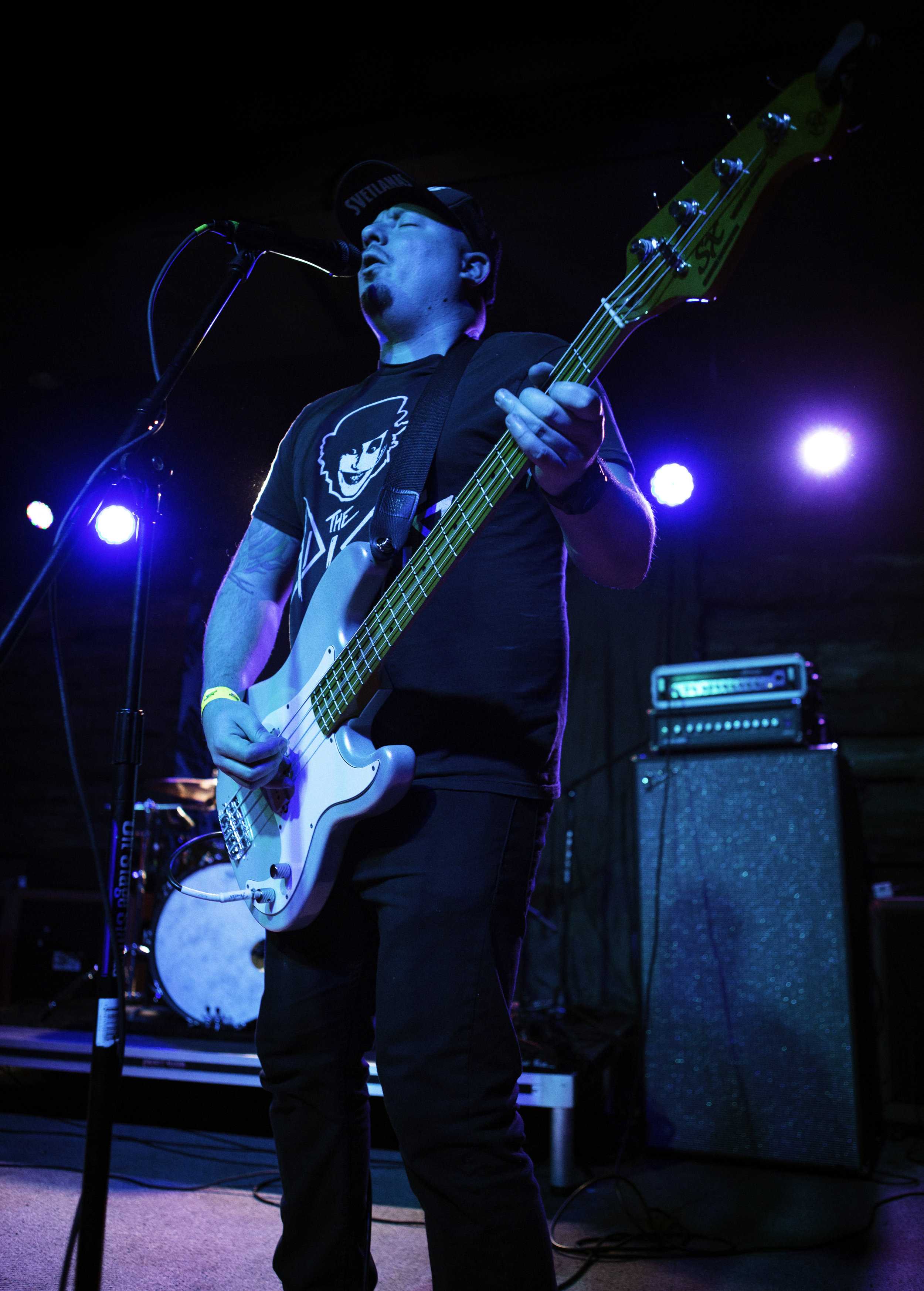   “Dangerous Dave” (bass/vocals) of The Queers playing one of the band’s hits, “Kicked-Out of the Webelos.”  