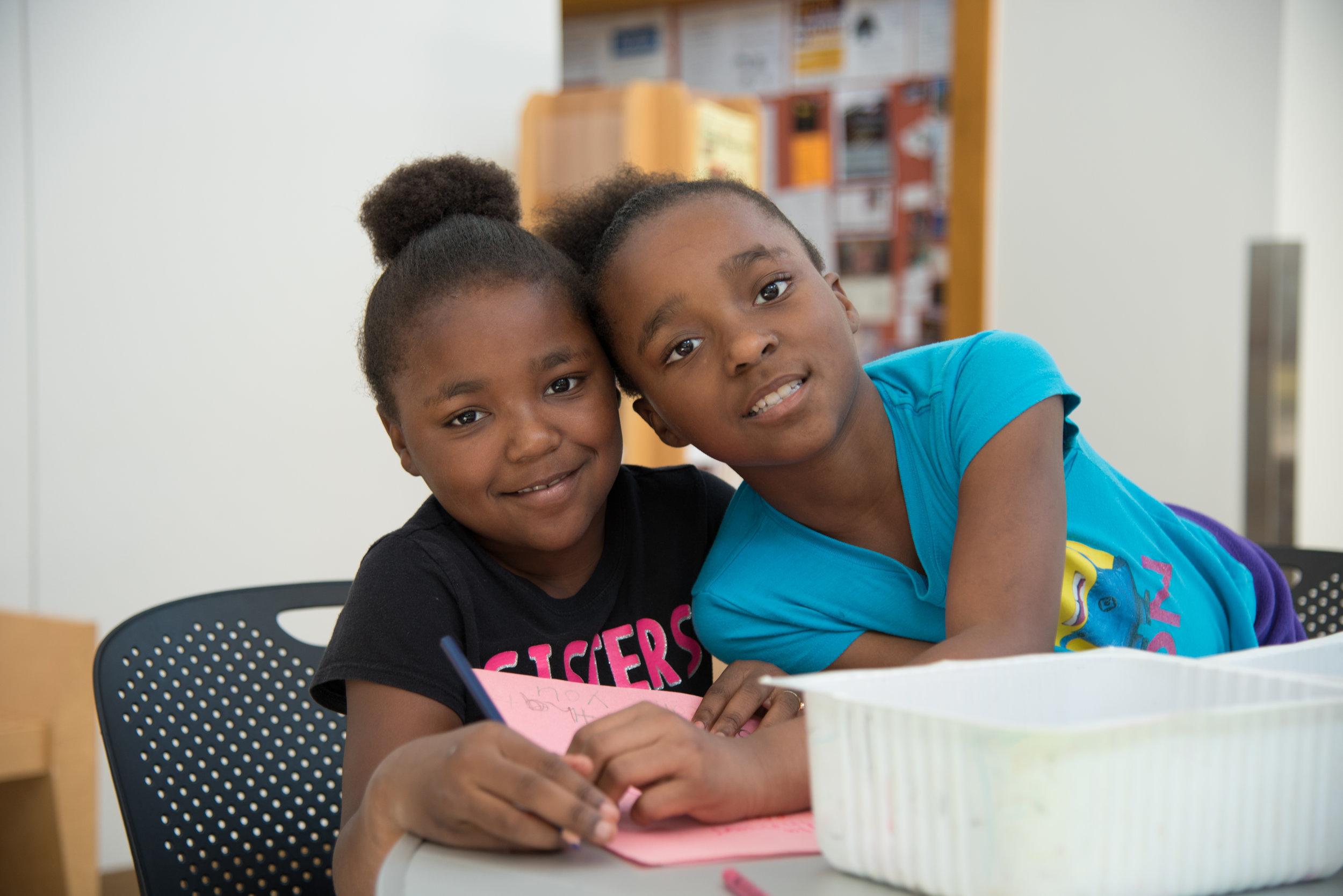  Left to right: Mackenzie, Mckayla  “I’m excited about learning how to play drums,” says Mckayla, age 7. Her friend, Mackenzie, shyly agrees.    