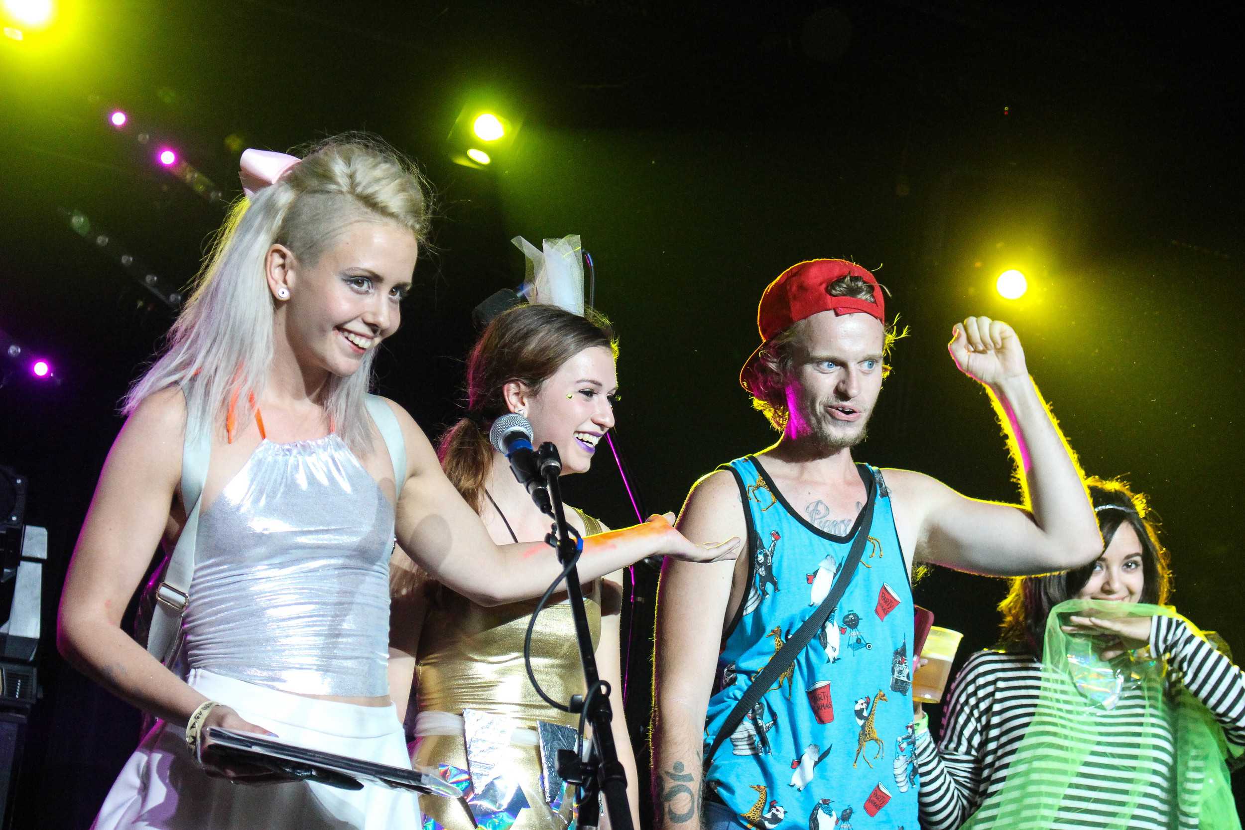   Festival-goers compete for the Best Alien Costume, which is judged by crowd reaction.       