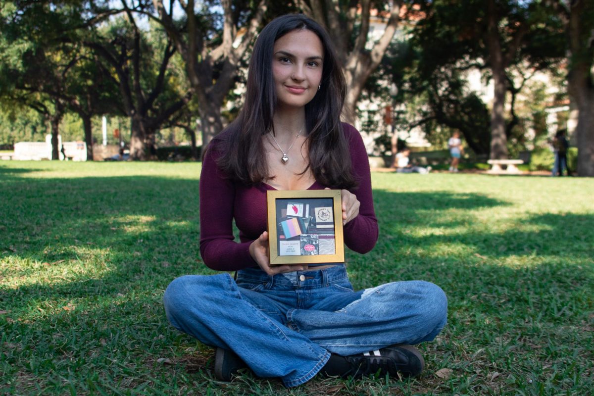 UT sophomore Shea Anderson poses with her matchbook collection.